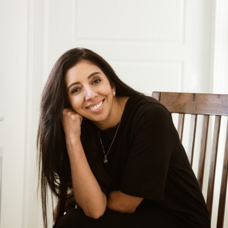 Citrus Connect founder Leena Parmar smiling while discussing sales recruitment strategy.