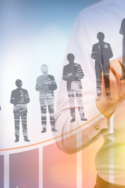 Silhouettes of business professionals standing on growth steps, representing tradespeople in sales.