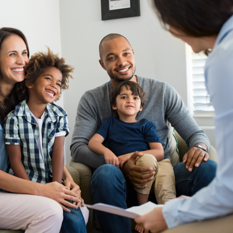 In home sales consultation with a family, everyone smiling
