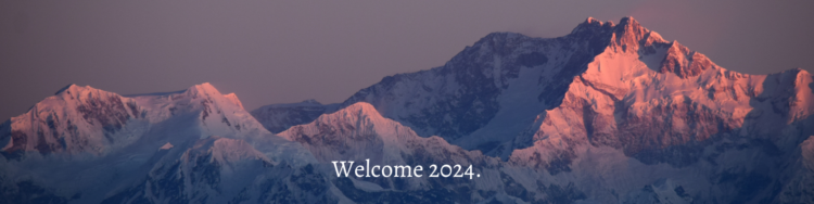 Welcome 2024 banner with a mountain scene in the background